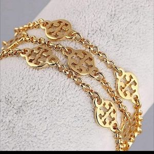 TORY BURCH 3 strand bracelet in 16kt plated gold